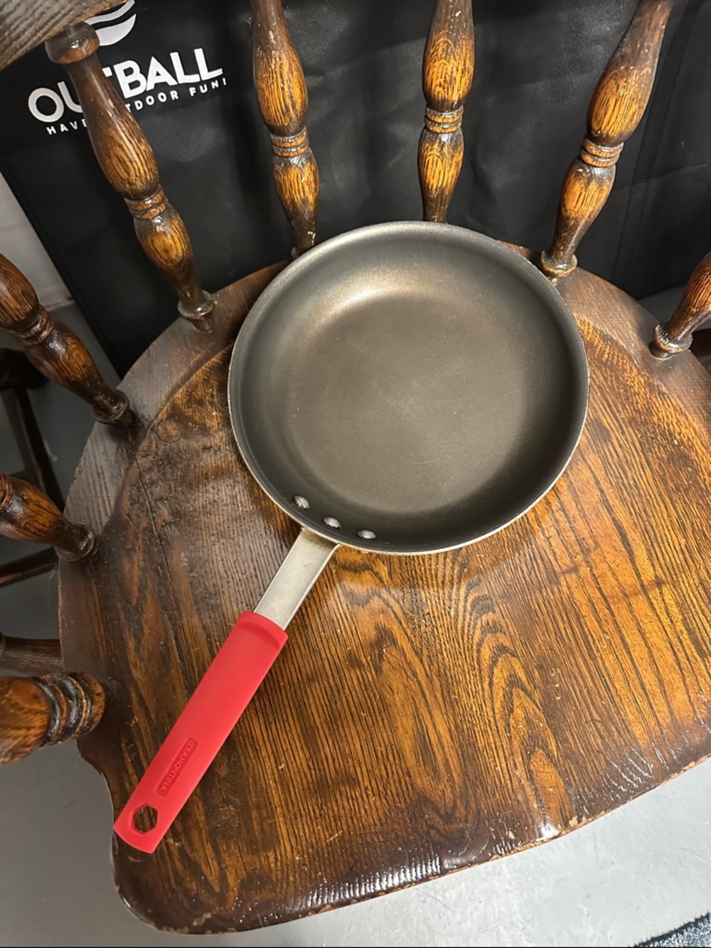 Nonstick Tramontina Frying Pan with Red Silicone Handle